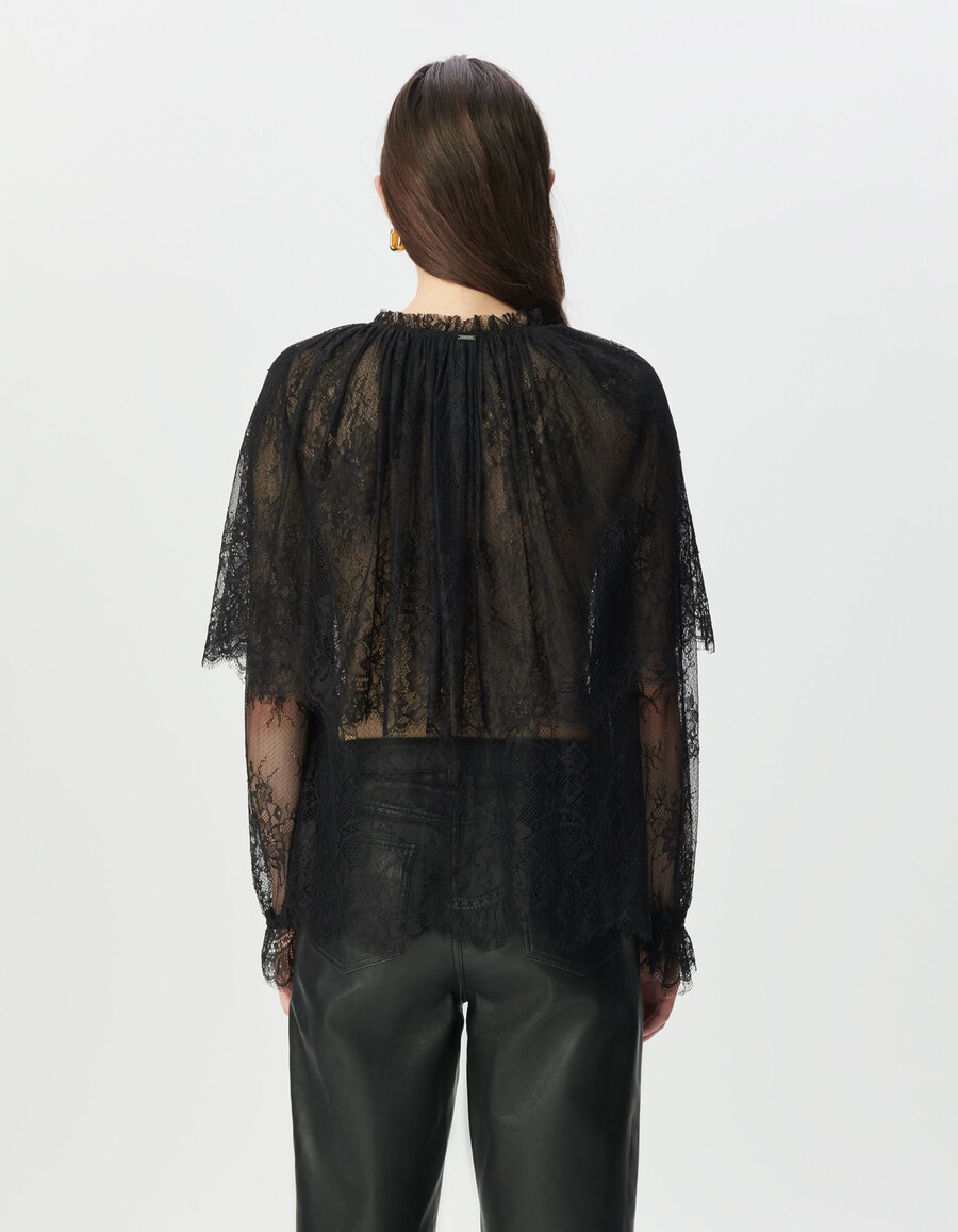 schwarze damenbluse aus spitze mit breiten rüschen