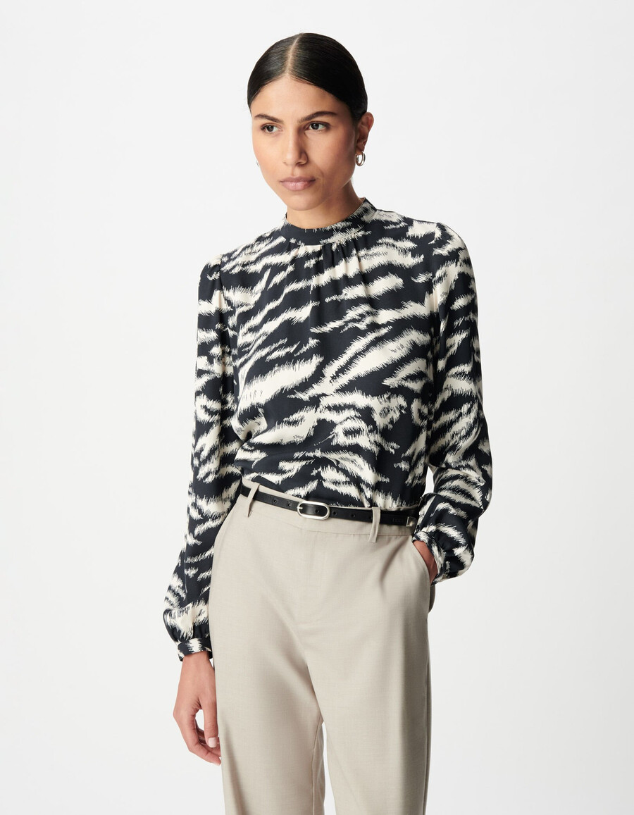 schwarze damenbluse mit zebramuster
