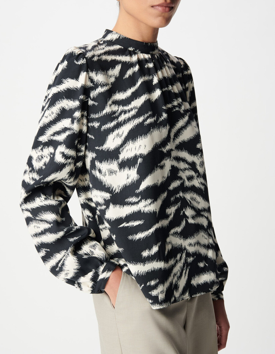 schwarze damenbluse mit zebramuster