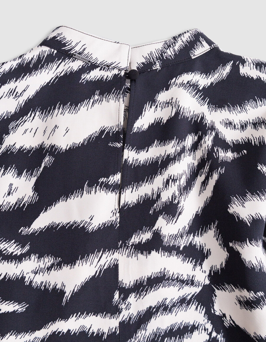 schwarze damenbluse mit zebramuster