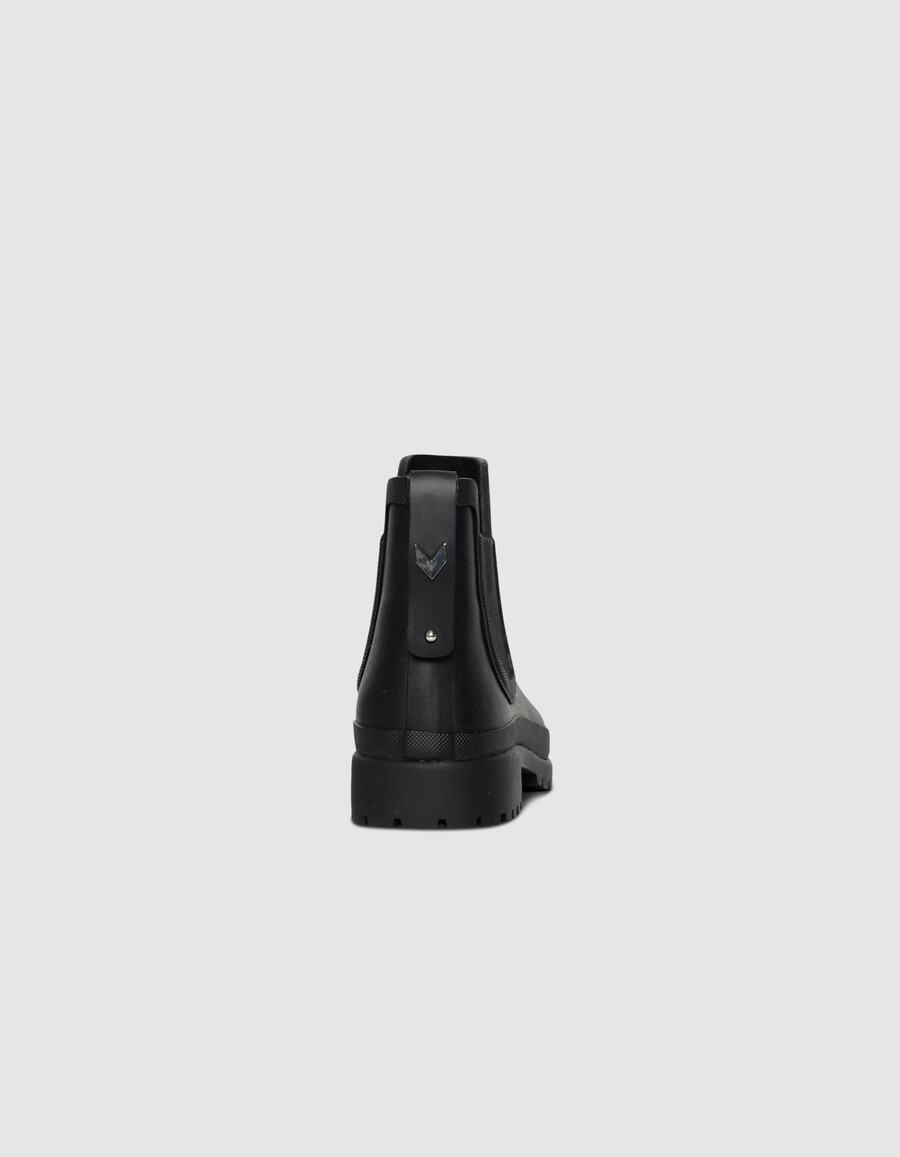 schwarze chelsea-regenstiefel für damen mit profilsohle