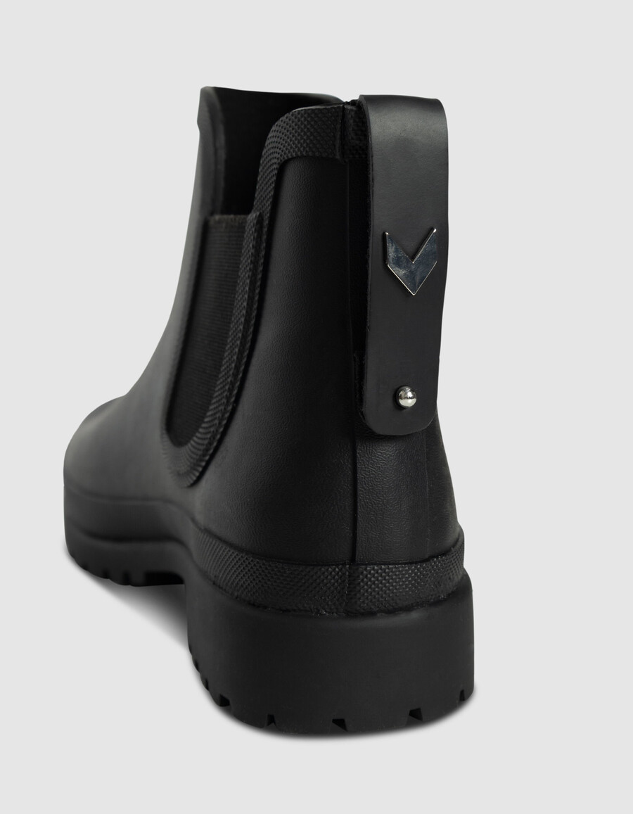schwarze chelsea-regenstiefel für damen mit profilsohle