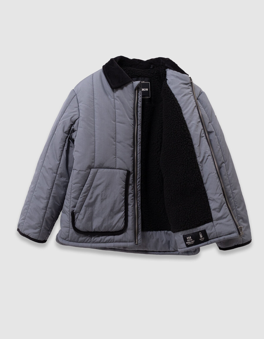 blaue steppjacke für jungen mit samtkragen