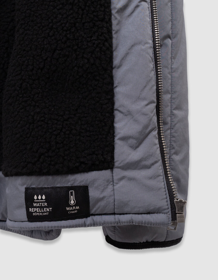 blaue steppjacke für jungen mit samtkragen