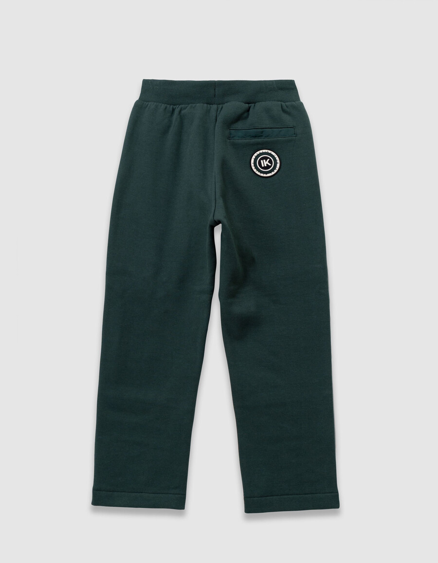 grüne jogginghose für jungen mit tasche aus verschiedenen stoffen