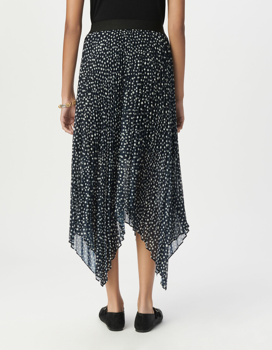 damen-langrock mit marineblauem polka-dot-muster und falten