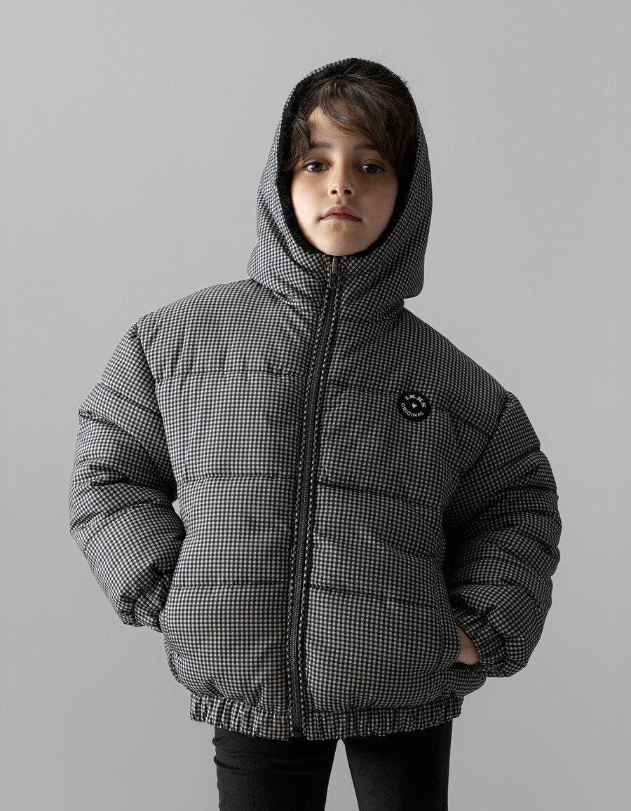 schwarze wendbare steppjacke für mädchen mit hahnentrittmuster und sherpa-futter