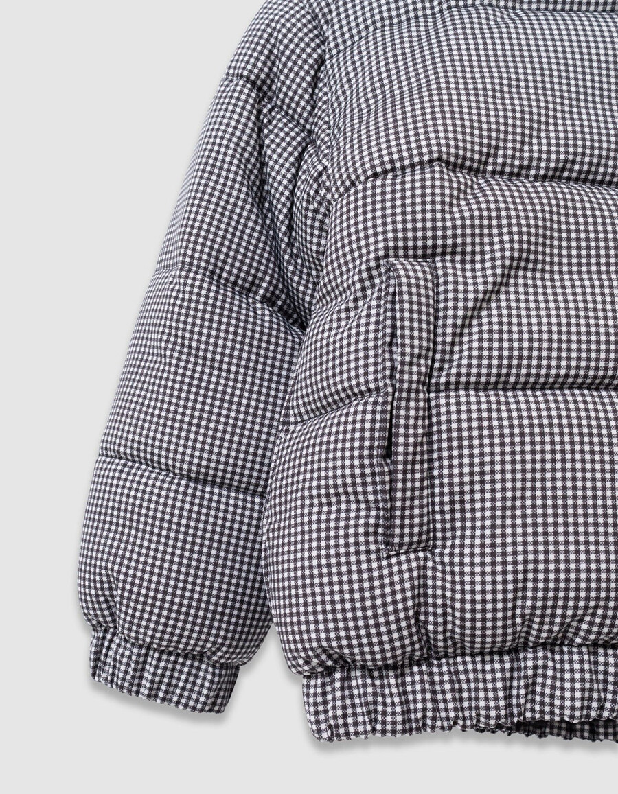 schwarze wendbare steppjacke für mädchen mit hahnentrittmuster und sherpa-futter