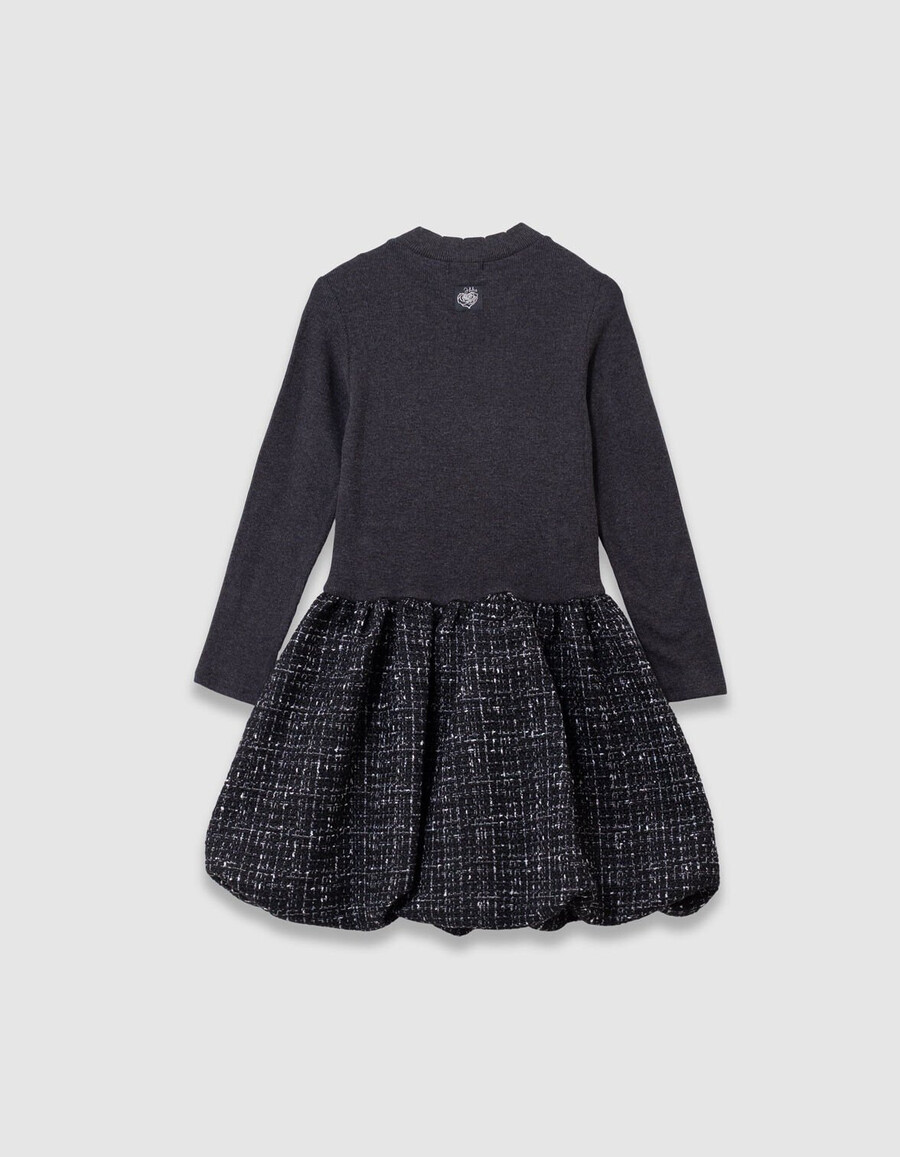 schwarzes mädchenkleid aus tweed-optik und verschiedenen stoffen