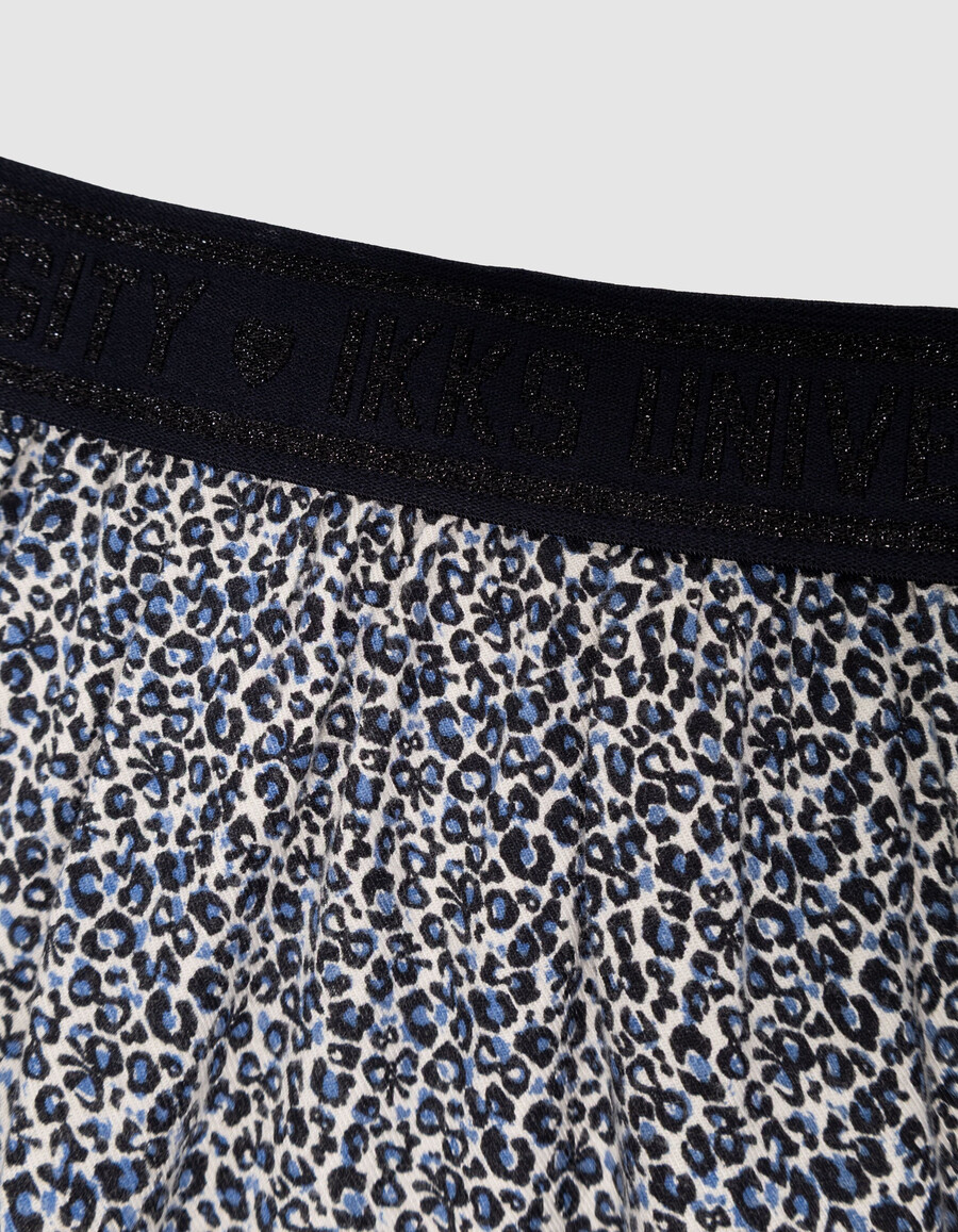 kurzer mädchenrock in marineblau mit leoparden-schleifenmuster