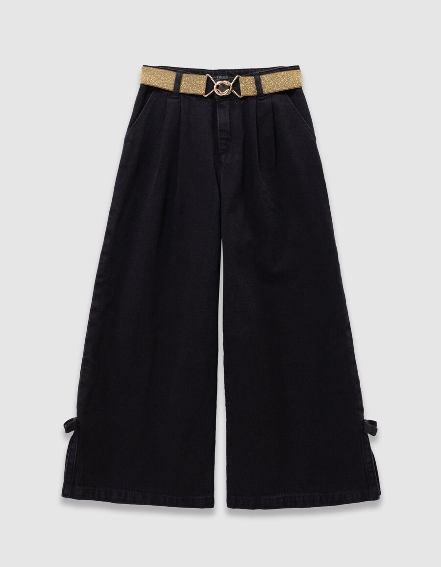 schwarze mädchenjeans mit weitem bein falten und schleifen