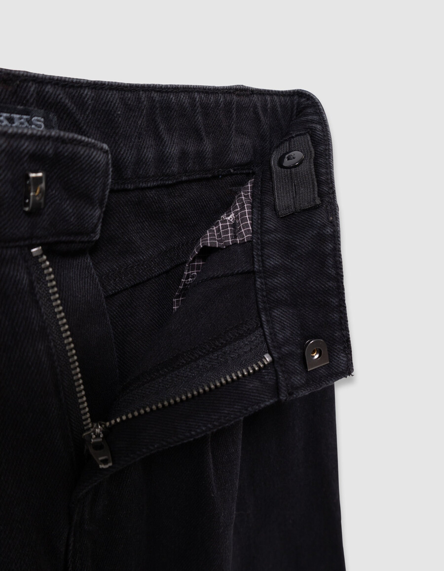 schwarze mädchenjeans mit weitem bein falten und schleifen