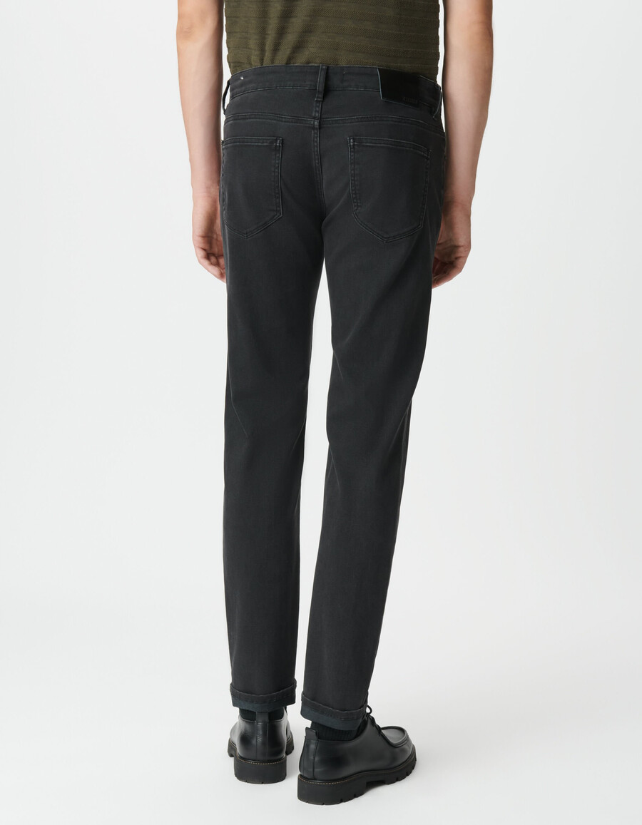 schwarze bruce slim jeans für herren gealtert