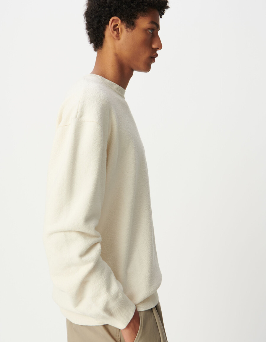 herren-sweatshirt aus ecrufarbenem strick mit bouclette-futter