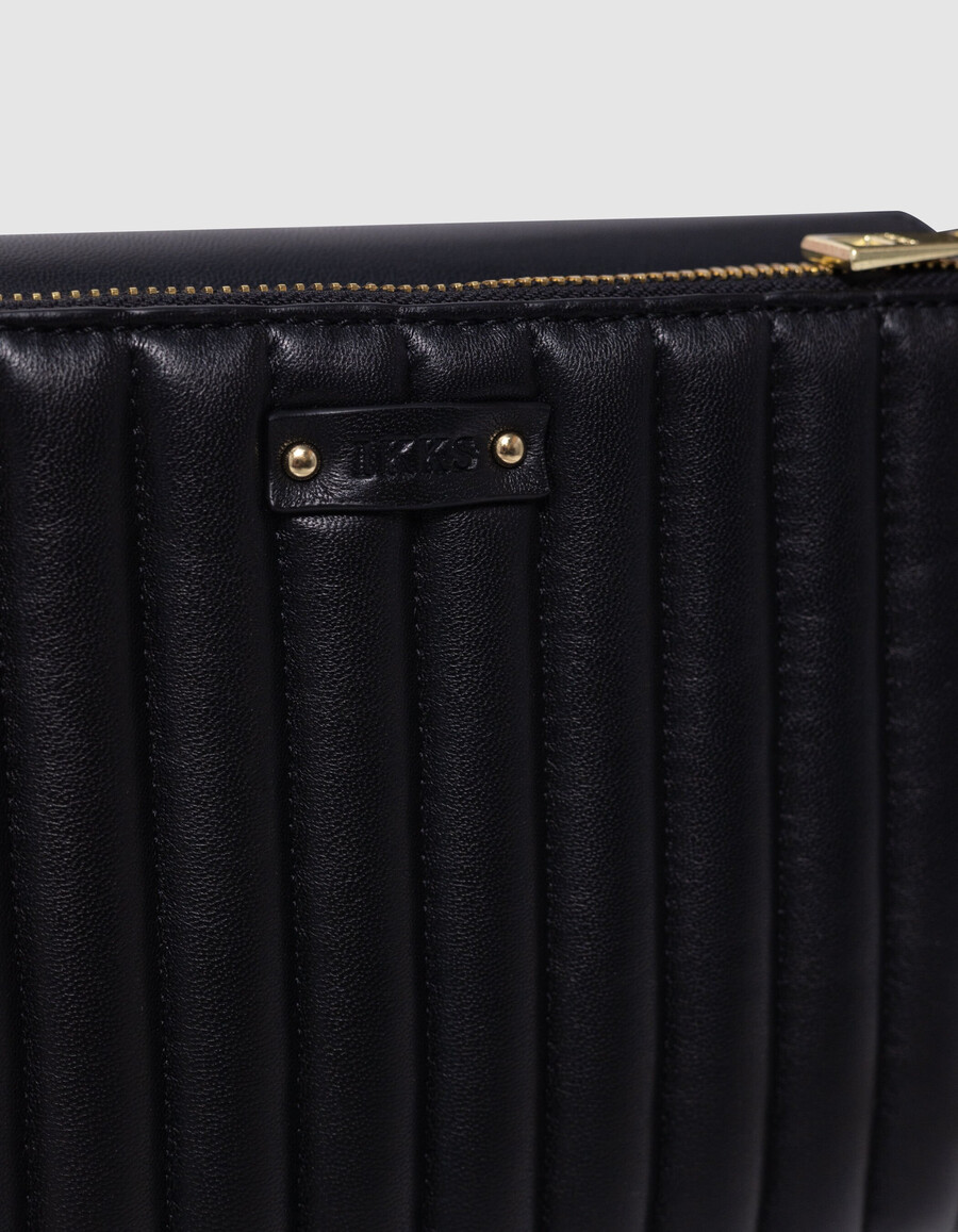 die 111 romy tasche aus schwarzem leder mit goldfarbenen metallic-metallic-details für damen