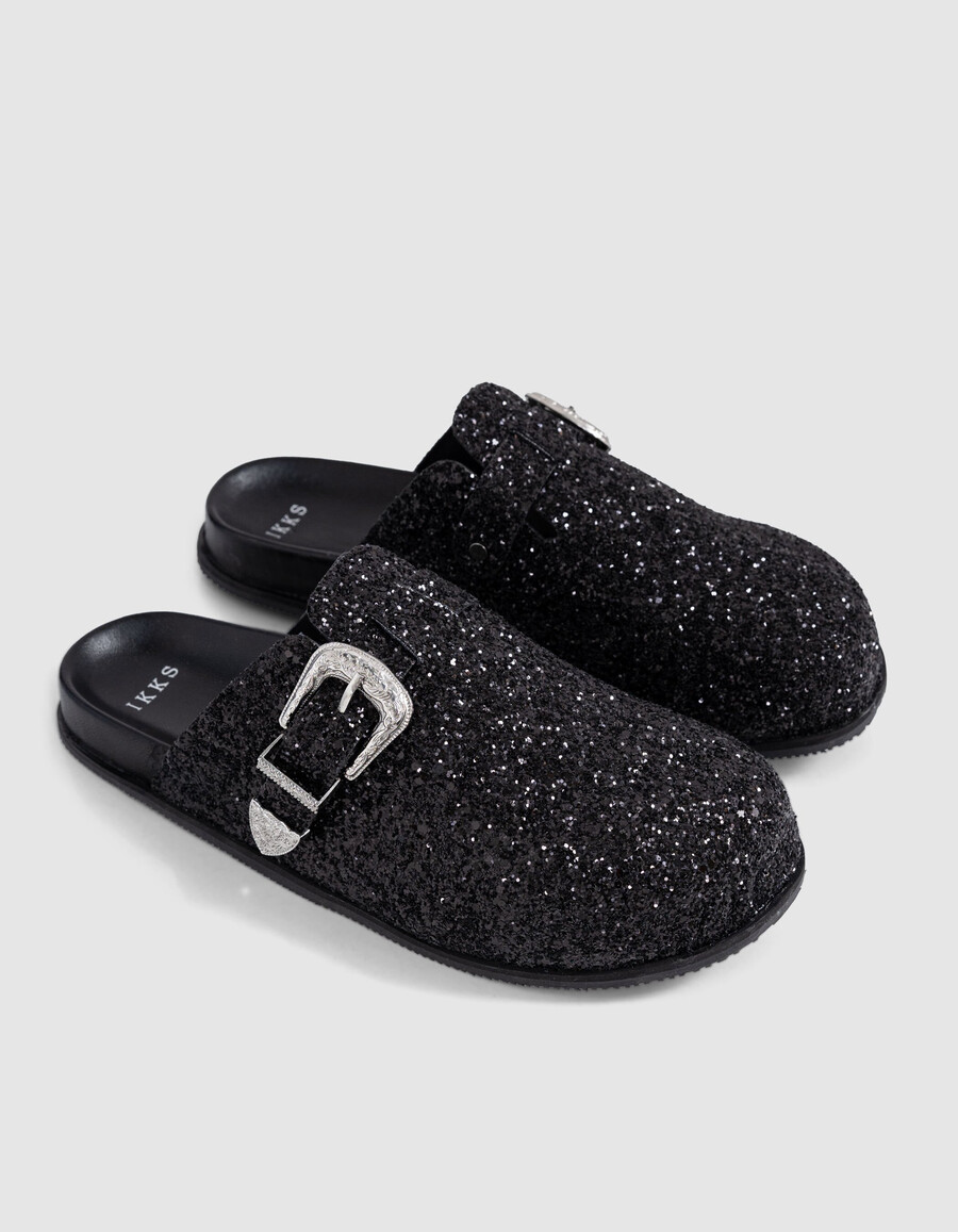 schwarze clogs mit mikropailletten und westernschnalle für damen