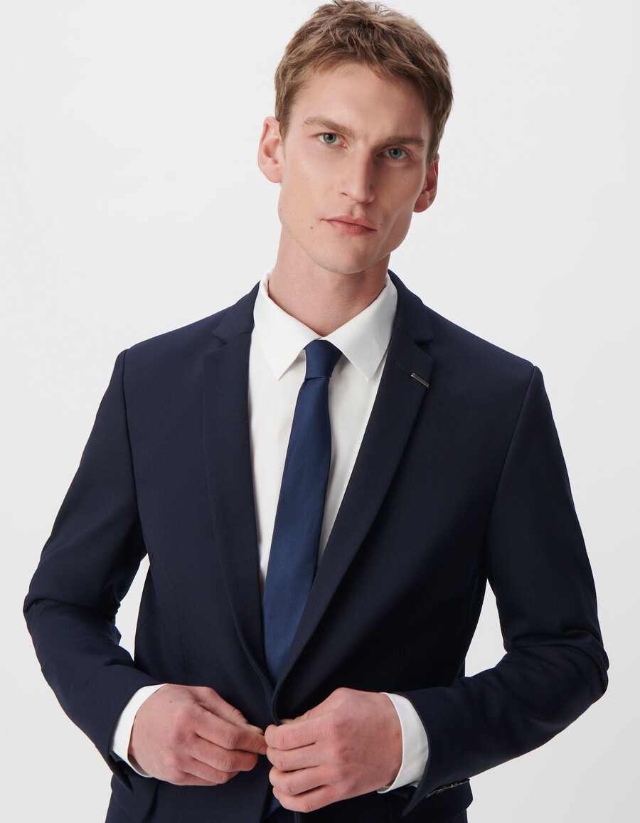 herren-strickjacke milano in marineblau schmal geschnitten