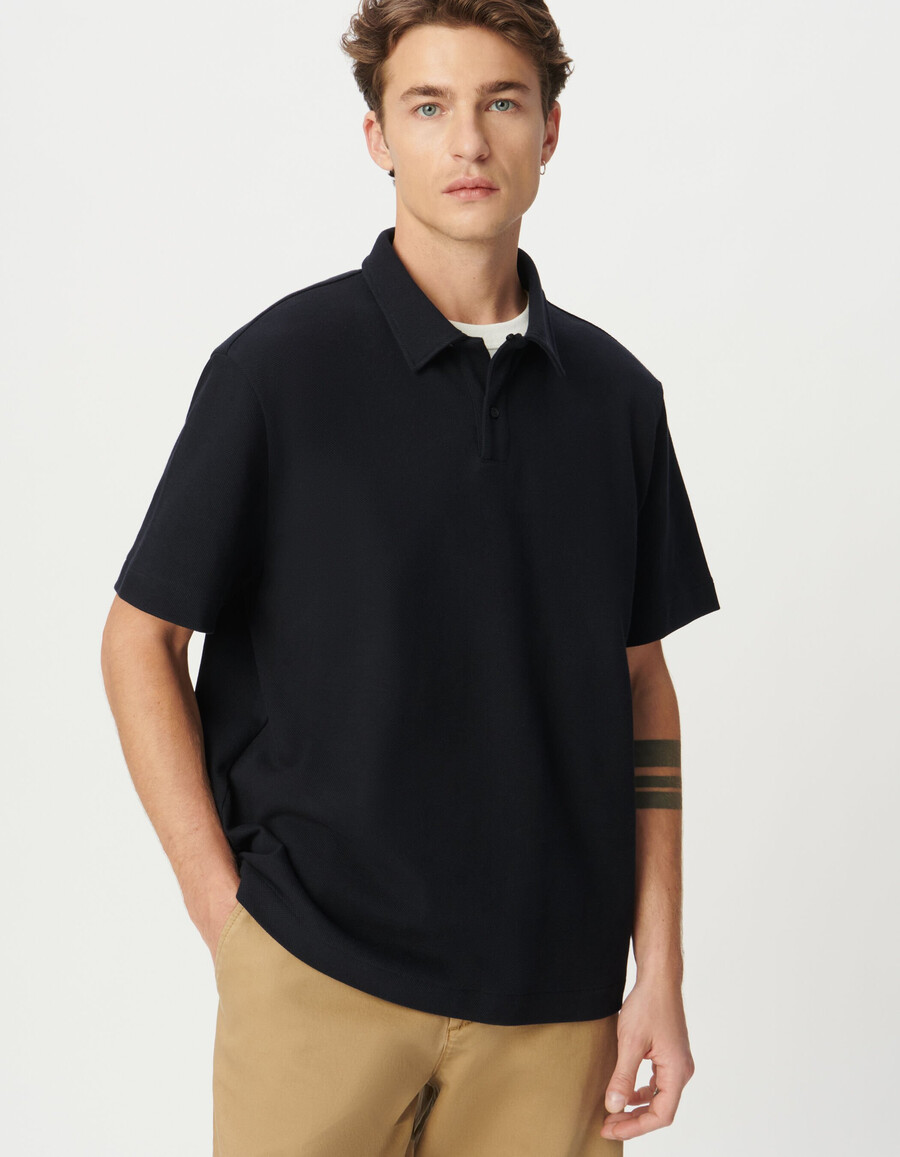herren-polohemd aus marineblauem piqué-strick