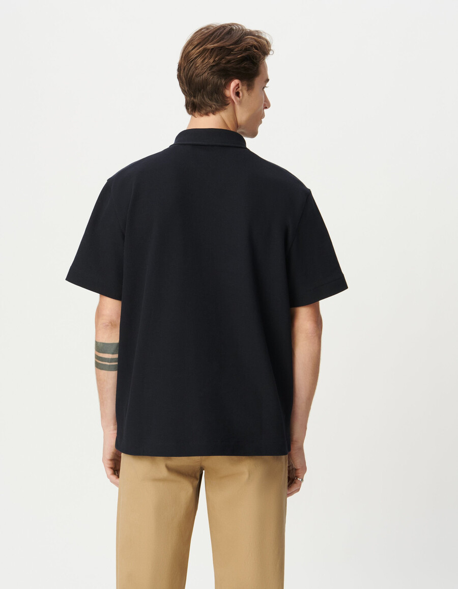 herren-polohemd aus marineblauem piqué-strick