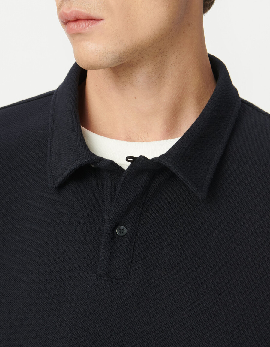 herren-polohemd aus marineblauem piqué-strick