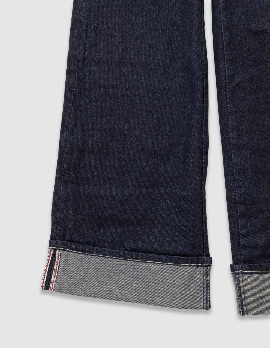 marineblaue mädchenjeans mit weitem bein und festem umschlag