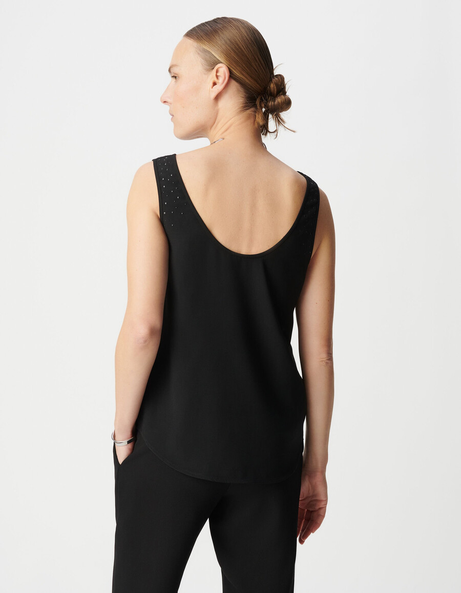 wendbares schwarzes tanktop für damen mit nieten