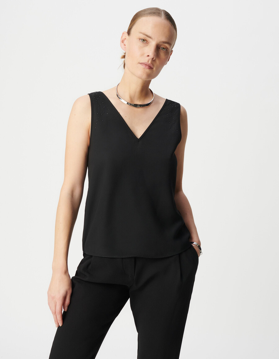 wendbares schwarzes tanktop für damen mit nieten