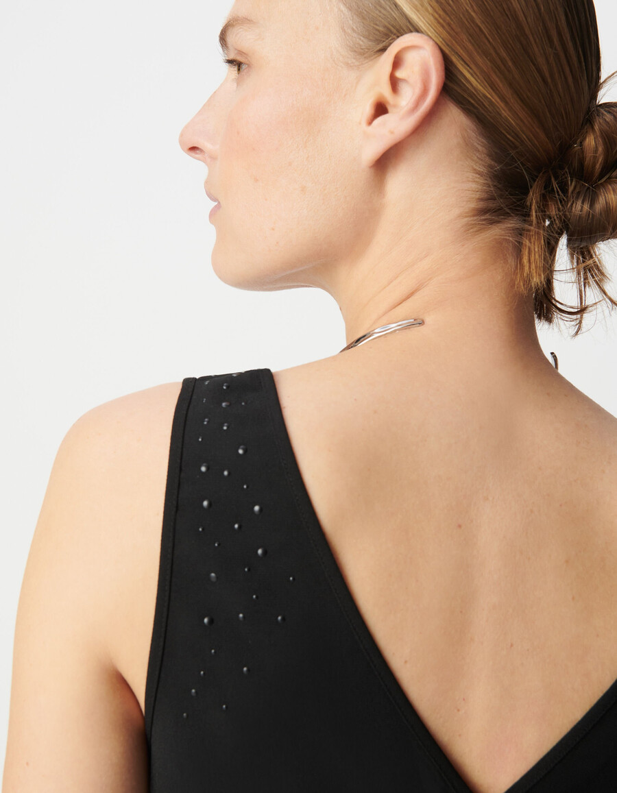 wendbares schwarzes tanktop für damen mit nieten
