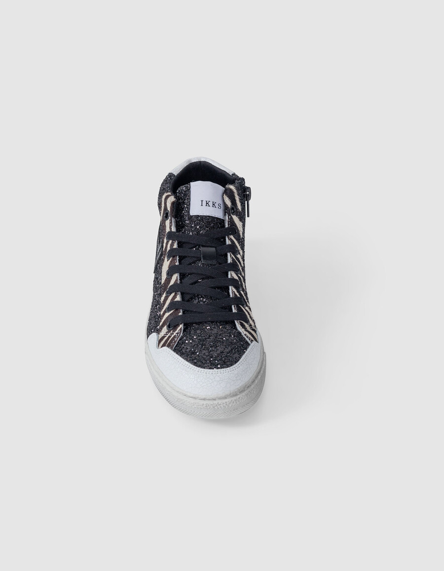 schwarze damen-sneaker mit mikro-pailletten und zebra-leder