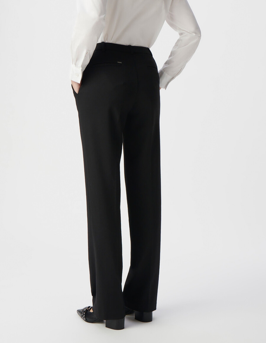 schwarze milano-strickhose für damen mit ausgestelltem bein