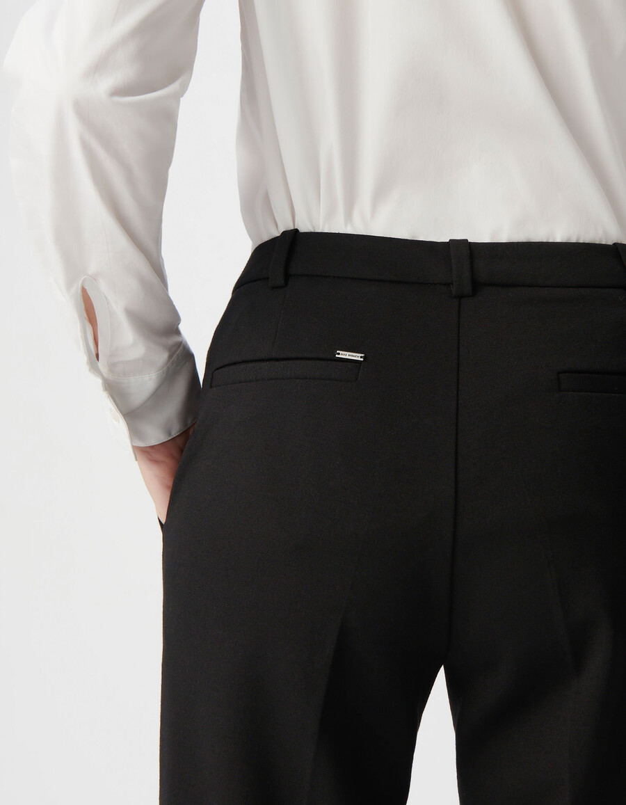 schwarze milano-strickhose für damen mit ausgestelltem bein