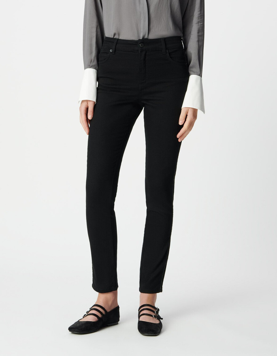 schwarze slim-fit-jeans für damen mit geflochtenem seitendetail