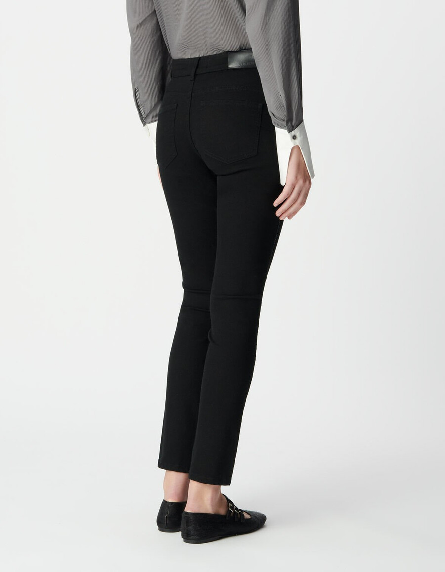 schwarze slim-fit-jeans für damen mit geflochtenem seitendetail